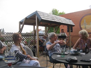 Laura, at left, hanging out with us on music night at Carmelita's in Calumet. I was amazed she'd read my novel. 